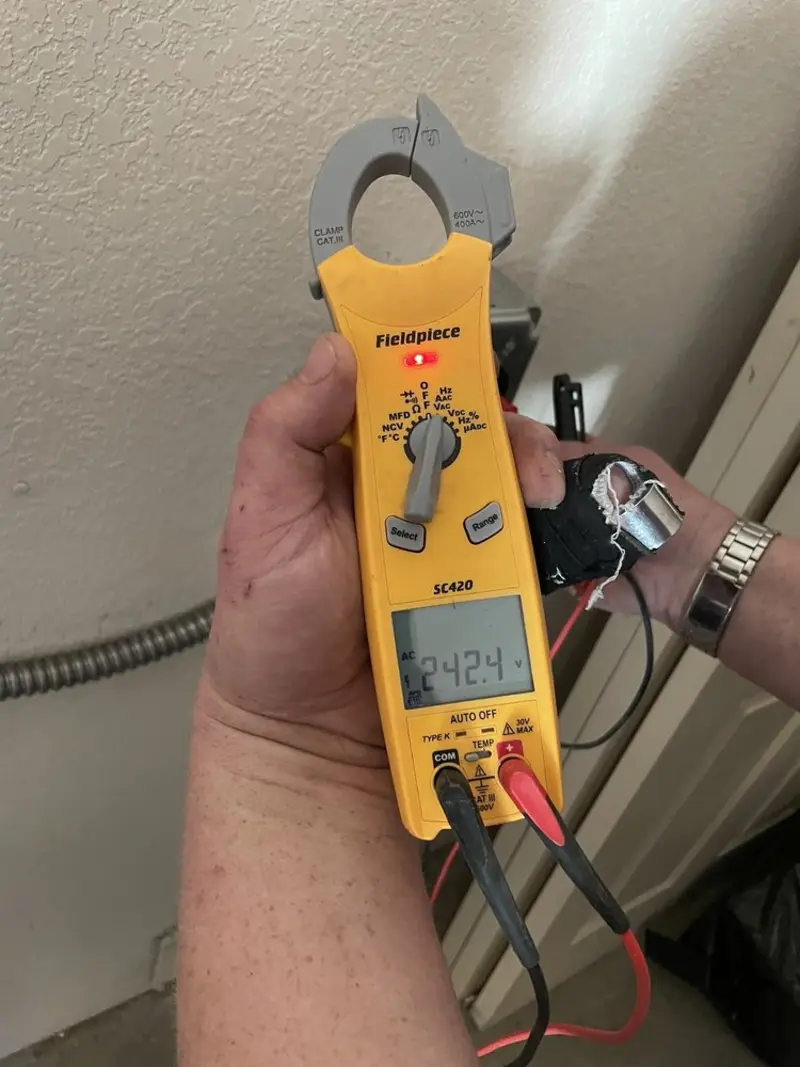 Voltage testing with clamp meter during Circuit Breaker Repair in Summersville